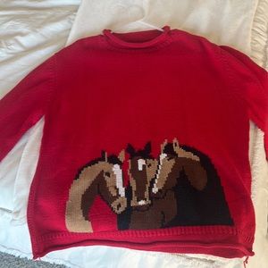 Red knit sweater with horses